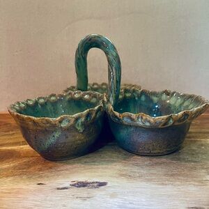 Martha Deloach signed pottery condiment dish in shades of tan bluegreen & purple